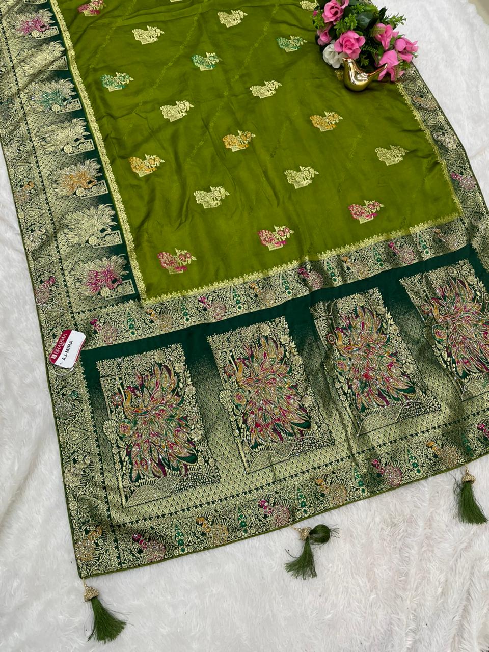 AJ-MIRA SATIN SILK WITH BEAUTFUL GRAND PALLU WITH HEAVY DESIGN WITH JARKAN WORK WITH MEENAKARI WORK AND LUXURIOUS TASSELS WITH CONTRAST BUTTI BLOUSE