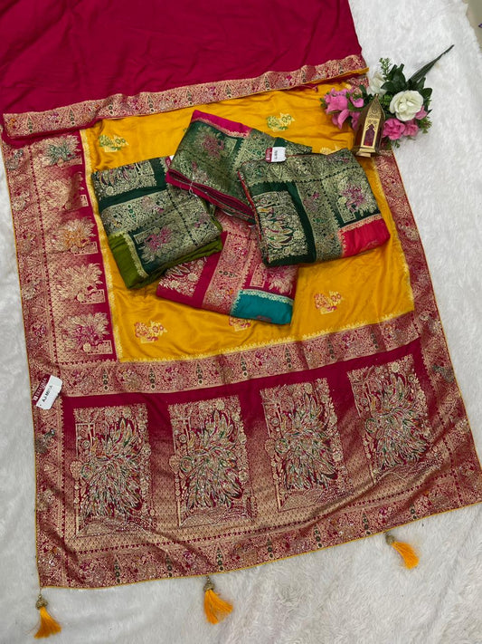 AJ-MIRA SATIN SILK WITH BEAUTFUL GRAND PALLU WITH HEAVY DESIGN WITH JARKAN WORK WITH MEENAKARI WORK AND LUXURIOUS TASSELS WITH CONTRAST BUTTI BLOUSE