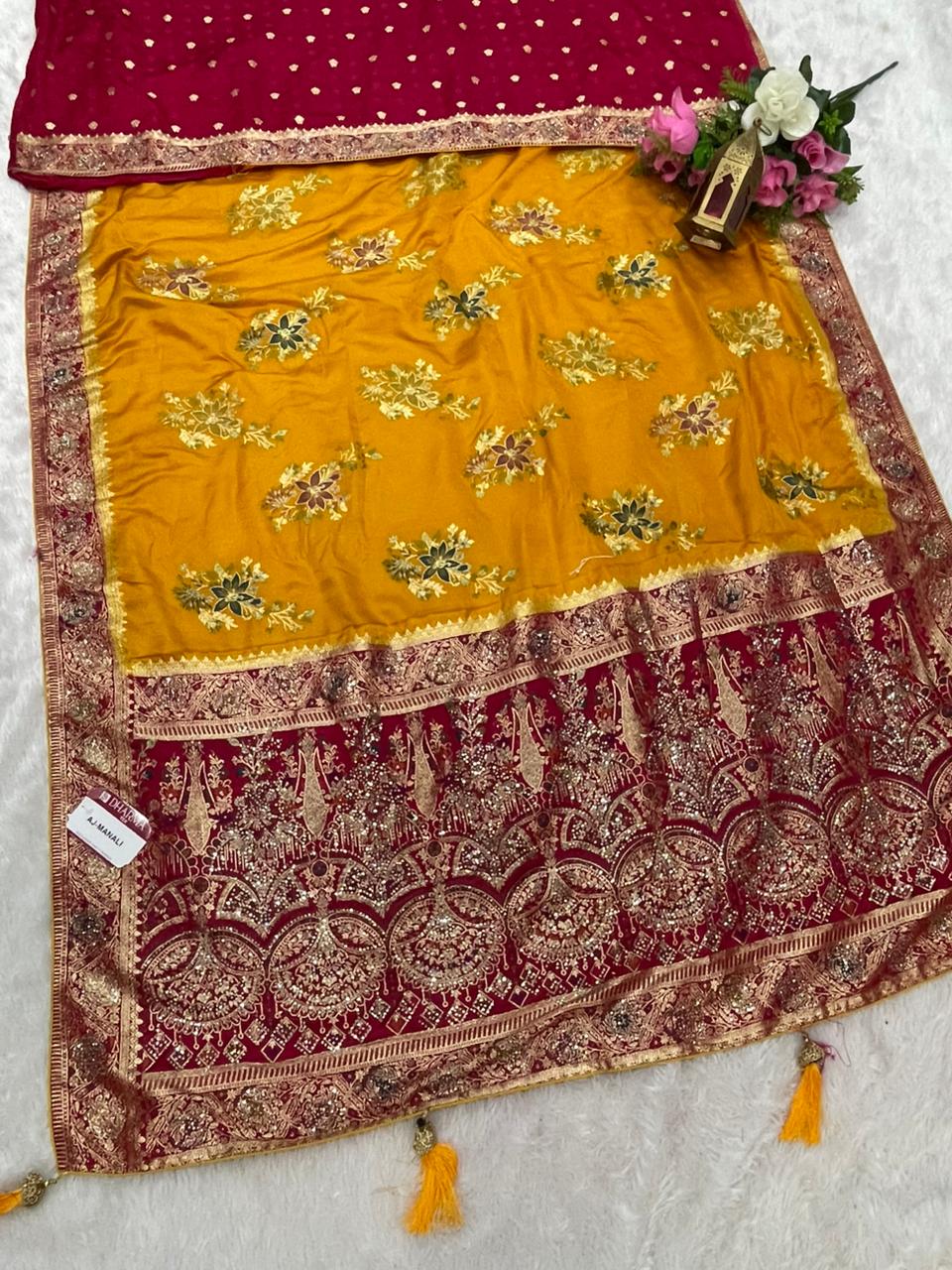 AJ-MANALI SATIN SILK WITH BEAUTFUL PALLU WITH HEAVY DESIGN WITH HEAVY JARKAN WORK WITH MEENAKARI WORK AND LUXURIOUS TASSELS WITH CONTRAST BUTTI BLOUSE