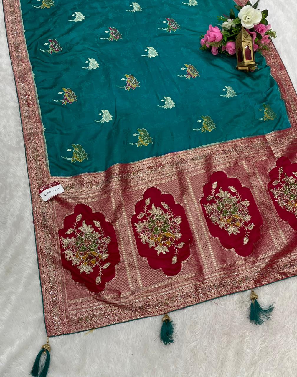 AJ-CITY LIGHT SATIN SILK WITH BEAUTFUL PALLU WITH JARKAN WORK WITH MEENAKARI WORK AND LUXURIOUS TASSELS WITH CONTRAST BLOUSE