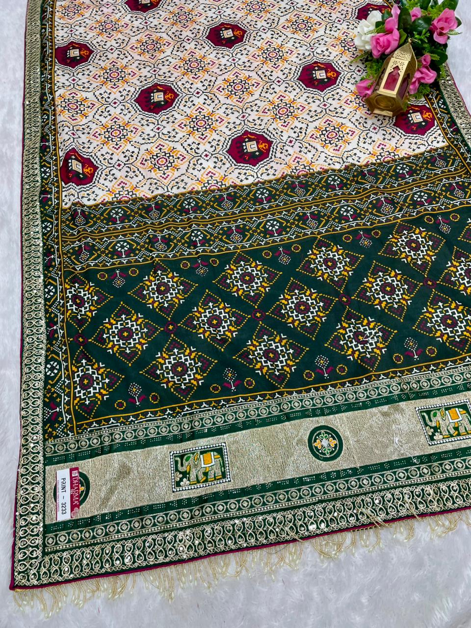 PRINT- 3233 MOST VIRAL SAREE ON INSTAGRAM , MAL COTTON SAREE WITH BEAUTIFUL PATOLA PRINT WITH HEAVY EMBROIDERY PALLU PANEL WITH HEAVY SEQUENCE EMBROIDERY BORDER WITH TRENDING TASSELS