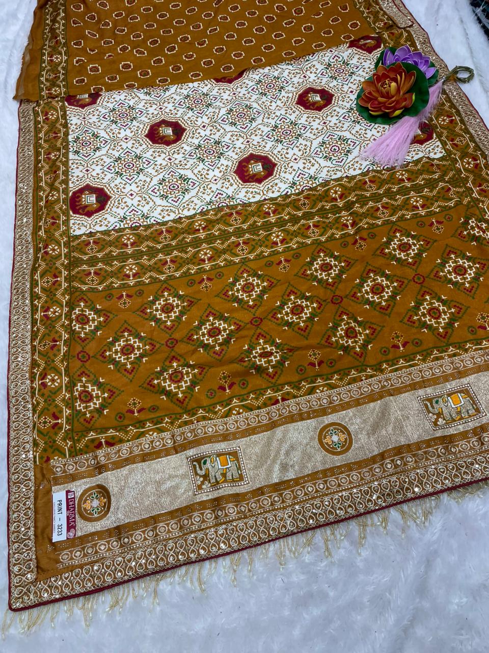 PRINT- 3233 MOST VIRAL SAREE ON INSTAGRAM , MAL COTTON SAREE WITH BEAUTIFUL PATOLA PRINT WITH HEAVY EMBROIDERY PALLU PANEL WITH HEAVY SEQUENCE EMBROIDERY BORDER WITH TRENDING TASSELS