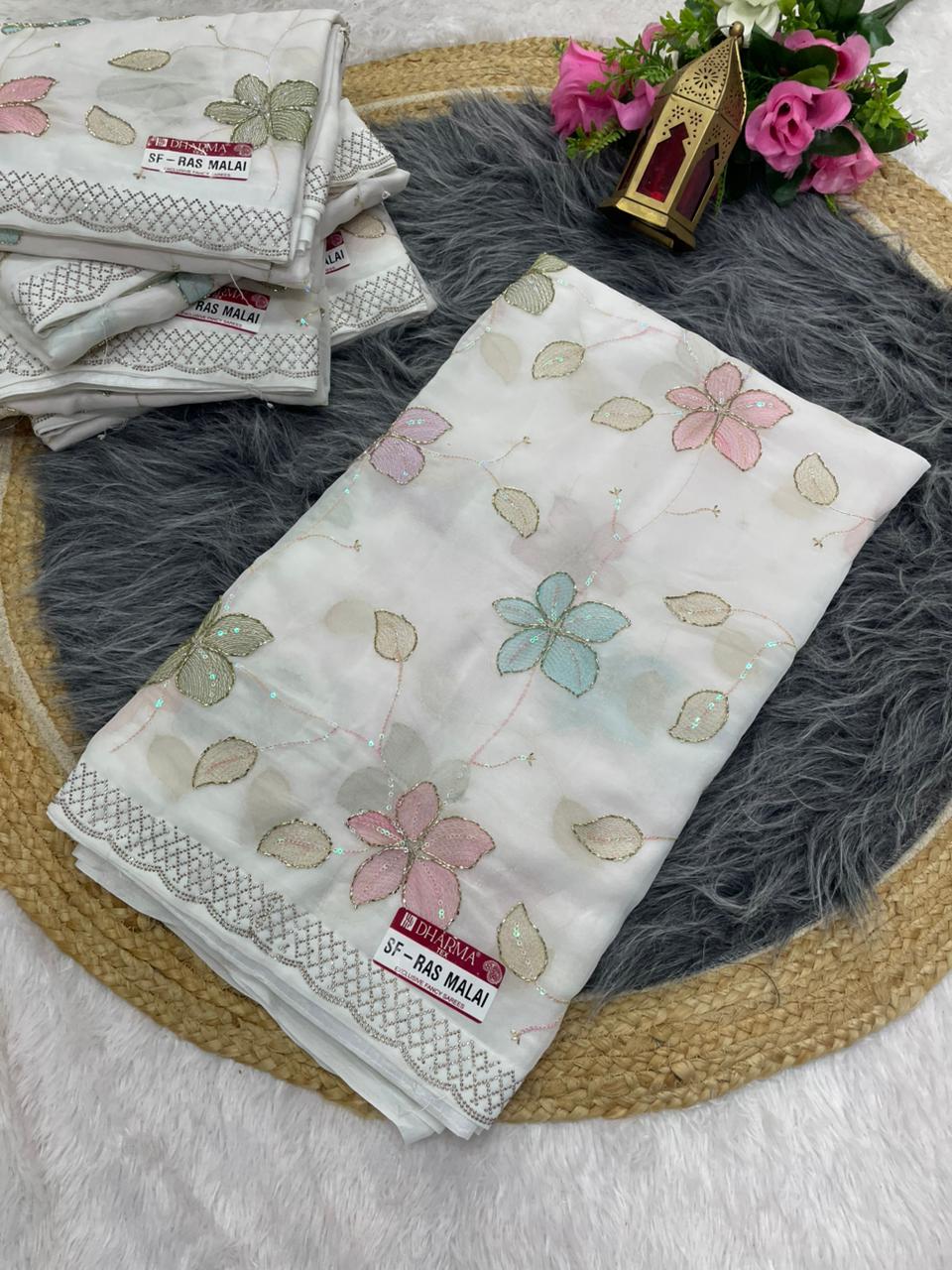 SF-RAS MALAI STAR GEORGETTE SAREE WITH BEAUTIFUL FLOWER DESIGN WITH WHITE COMMON AND HEAVY HANDWORK ON SAREE WITH DMC SIROSKI WORK WITH BEAUTIFUL BLOUSE