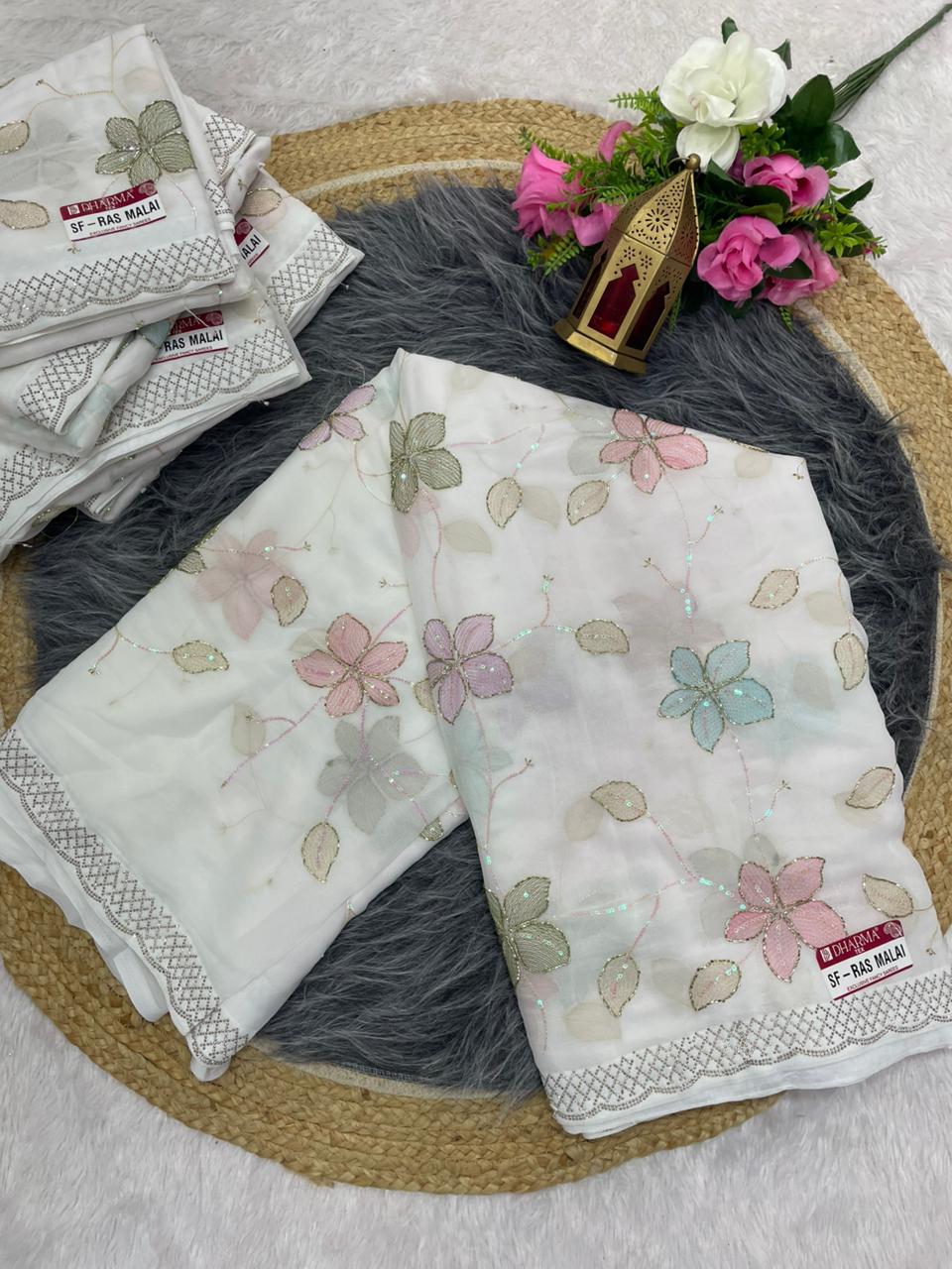 SF-RAS MALAI STAR GEORGETTE SAREE WITH BEAUTIFUL FLOWER DESIGN WITH WHITE COMMON AND HEAVY HANDWORK ON SAREE WITH DMC SIROSKI WORK WITH BEAUTIFUL BLOUSE