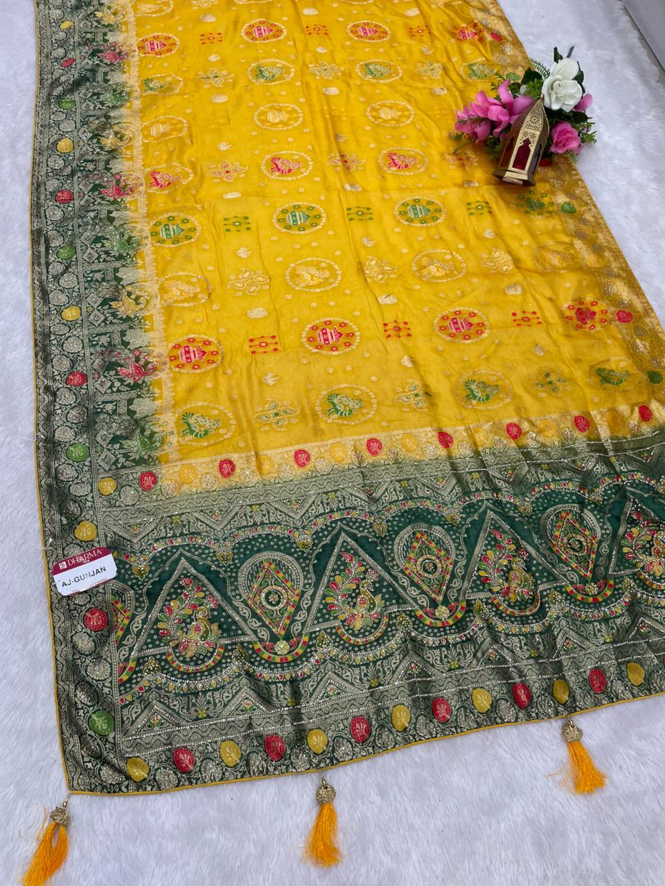 AJ-GUNJAN FENDI SILK FABRIC SAREE WITH 2D DYING WORK WITH MEENAKARI WORK AND DIAMOND WORK WITH PEACOCK FIGURE DESIGN WITH CONTRAST BLOUSE AND PALLU WITH LUXURIOUS TASSELS WITH BUTTI BLOUSE