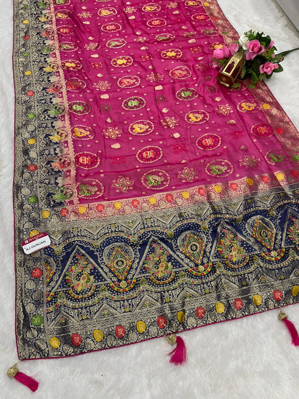 AJ-GUNJAN FENDI SILK FABRIC SAREE WITH 2D DYING WORK WITH MEENAKARI WORK AND DIAMOND WORK WITH PEACOCK FIGURE DESIGN WITH CONTRAST BLOUSE AND PALLU WITH LUXURIOUS TASSELS WITH BUTTI BLOUSE