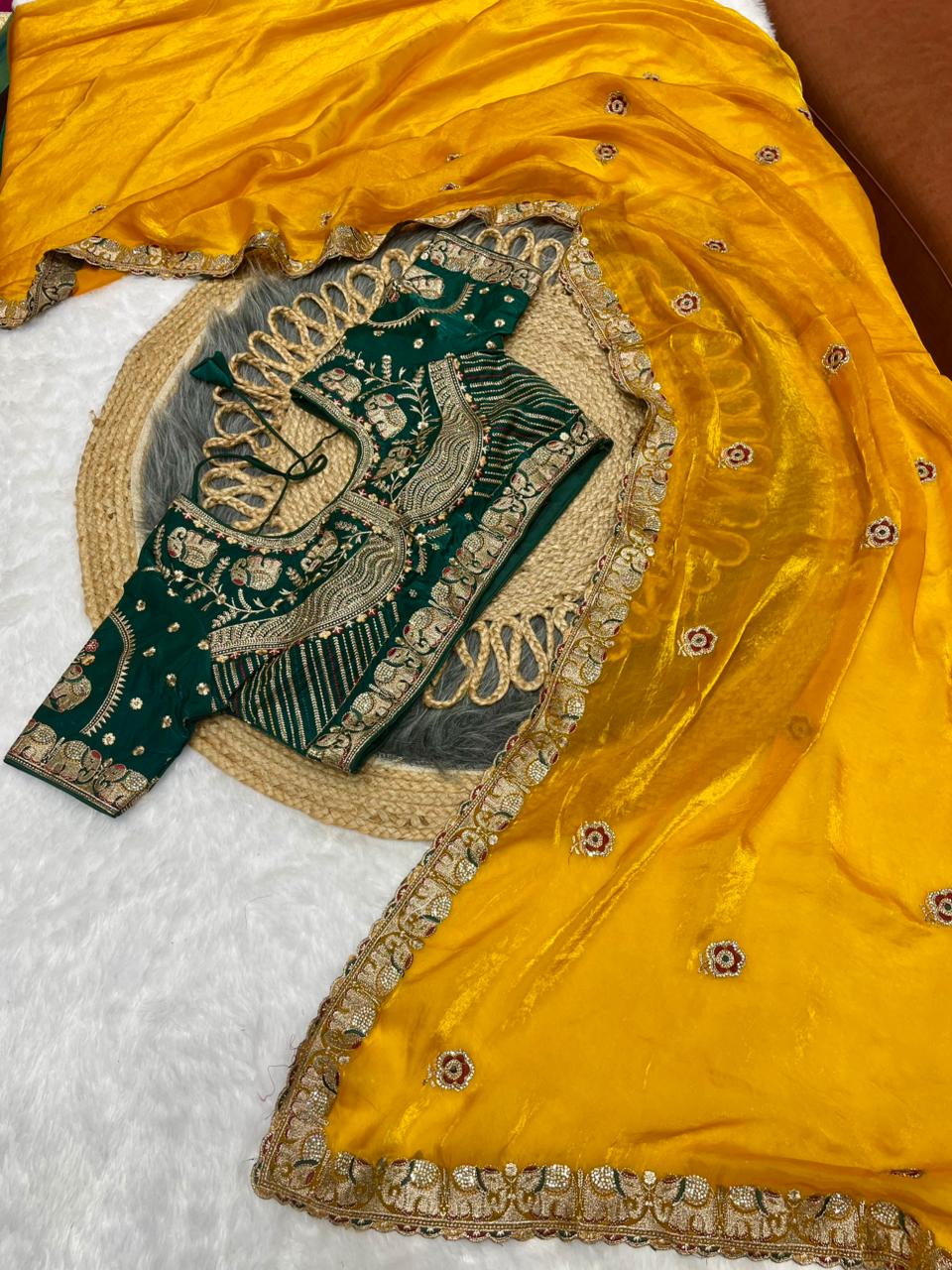 BS-JAGRUTI SATIN SAREE WITH HEAVY EMBROIDERY WORK WITH GAJRAJ DESIGN WITH JARKAN WORK WITH HEAVY STICHED BLOUSE