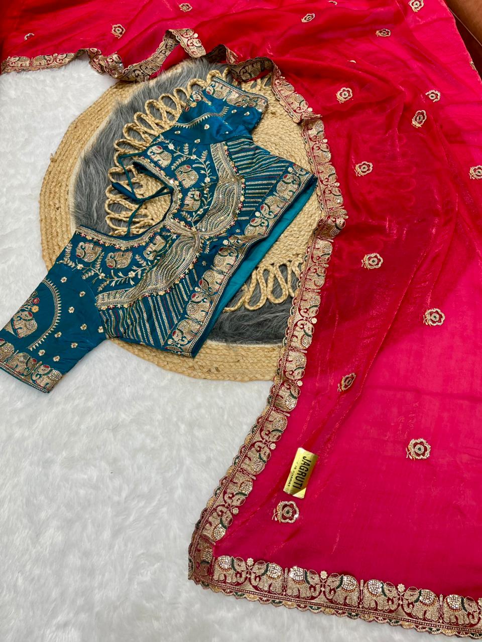 BS-JAGRUTI SATIN SAREE WITH HEAVY EMBROIDERY WORK WITH GAJRAJ DESIGN WITH JARKAN WORK WITH HEAVY STICHED BLOUSE