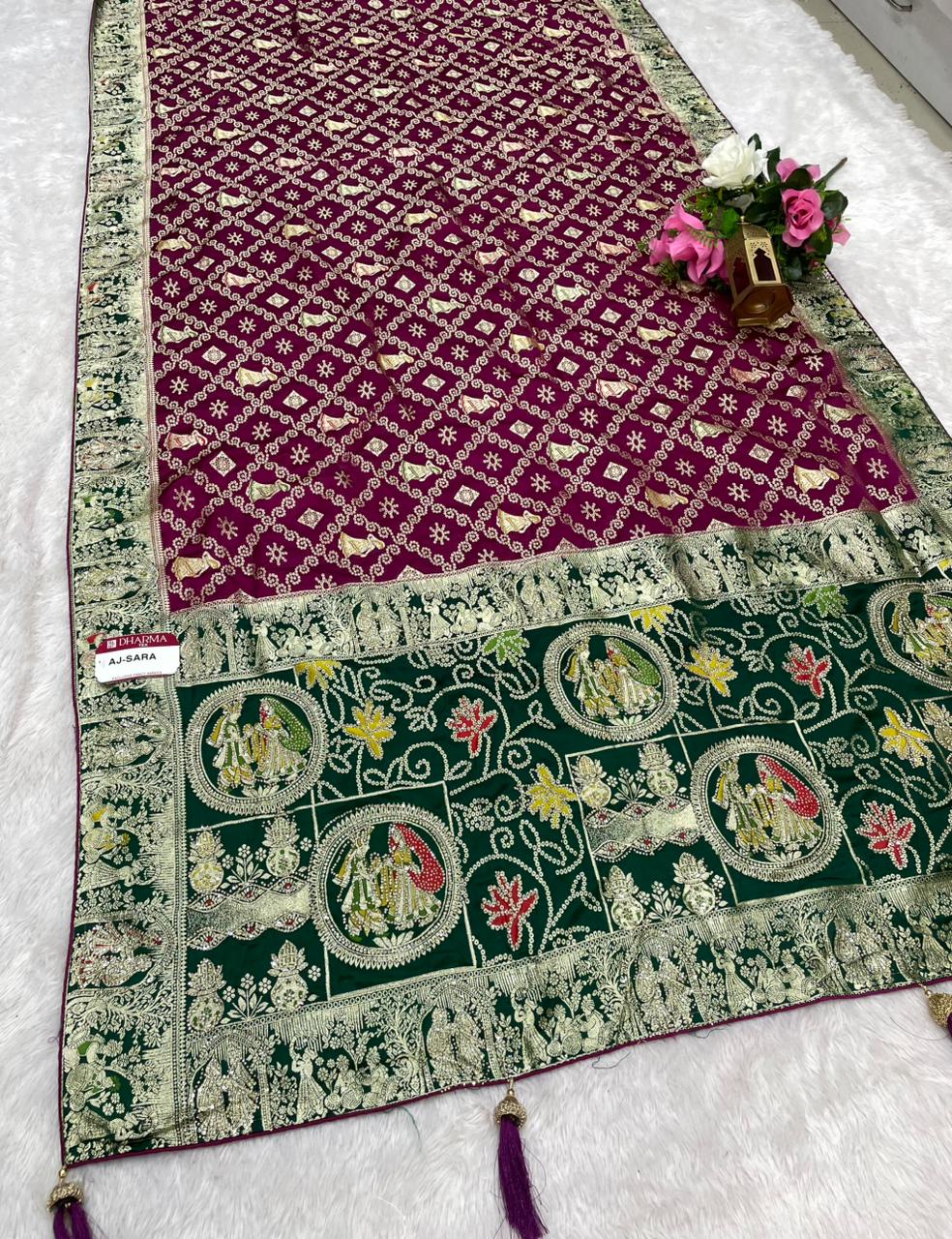 AJ-SARA NAYLON SATIN FABRIC SAREE WITH BEAUTIFUL GHATCOLA DESIGN WITH RICH PALLU DESIGN WITH CHAP HEAVY JARKAN WORK WITH CONTRAST PALLU AND LUXURIOUS TASSELS WITH BUTTI BLOUSE