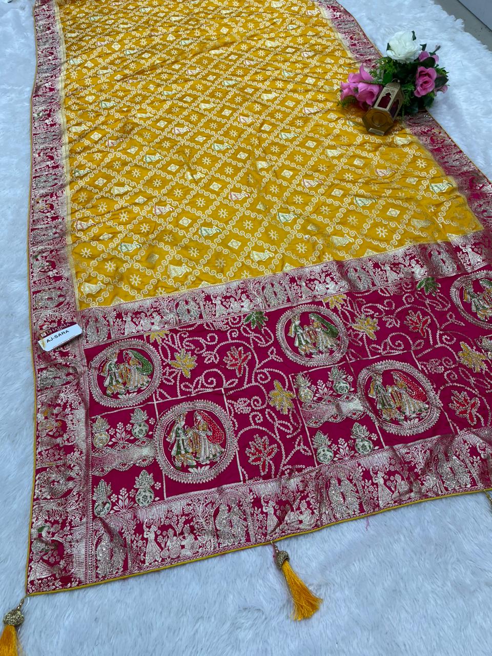 AJ-SARA NAYLON SATIN FABRIC SAREE WITH BEAUTIFUL GHATCOLA DESIGN WITH RICH PALLU DESIGN WITH CHAP HEAVY JARKAN WORK WITH CONTRAST PALLU AND LUXURIOUS TASSELS WITH BUTTI BLOUSE