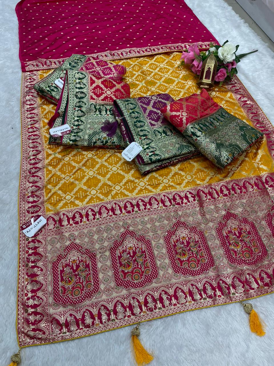 AJ-PALLAVI  NAYLON SATIN FABRIC SAREE WITH BEAUTIFUL GHATCOLA DESIGN WITH RICH PALLU DESIGN WITH CHAP HEAVY JARKAN WORK WITH CONTRAST PALLU AND LUXURIOUS TASSELS WITH BUTTI BLOUSE