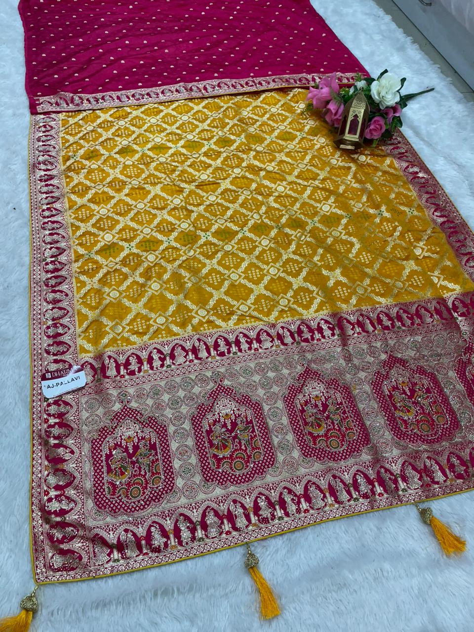 AJ-PALLAVI  NAYLON SATIN FABRIC SAREE WITH BEAUTIFUL GHATCOLA DESIGN WITH RICH PALLU DESIGN WITH CHAP HEAVY JARKAN WORK WITH CONTRAST PALLU AND LUXURIOUS TASSELS WITH BUTTI BLOUSE