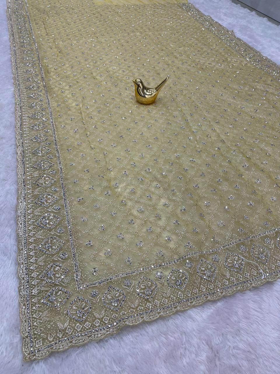 BS-ANVI DARK PREMIUM NET SAREE WITH HEAVY EMBROIDERY WORK WITH BEAUTIFUL JARKAN WORK VIRAL DESIGN WITH BEAUTIFUL MATCHING WITH WOR BLOUSE
