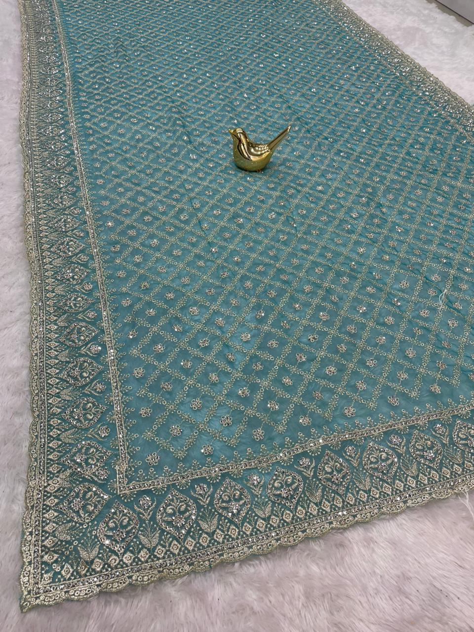 BS-ANVI DARK PREMIUM NET SAREE WITH HEAVY EMBROIDERY WORK WITH BEAUTIFUL JARKAN WORK VIRAL DESIGN WITH BEAUTIFUL MATCHING WITH WOR BLOUSE
