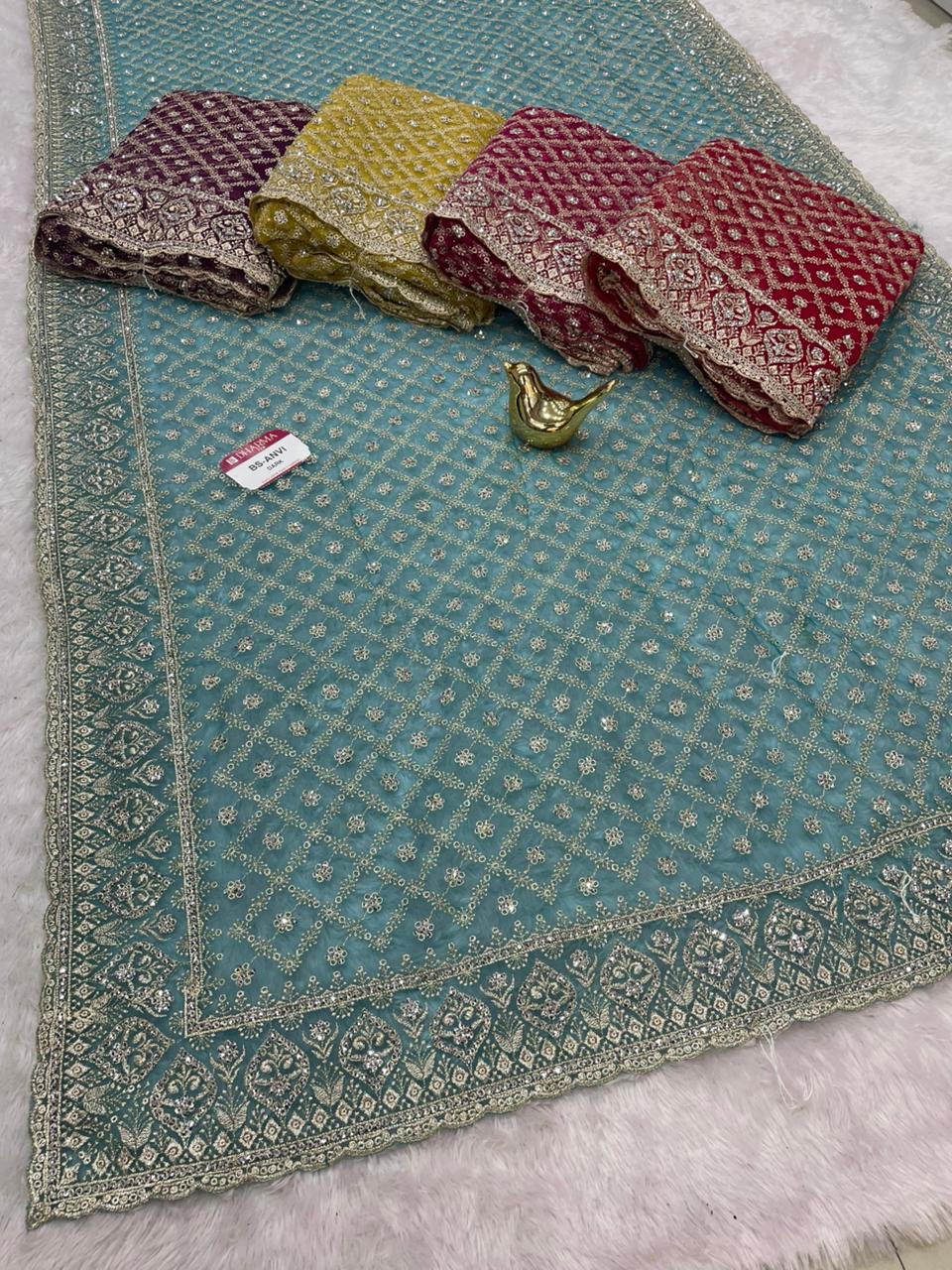 BS-ANVI DARK PREMIUM NET SAREE WITH HEAVY EMBROIDERY WORK WITH BEAUTIFUL JARKAN WORK VIRAL DESIGN WITH BEAUTIFUL MATCHING WITH WOR BLOUSE