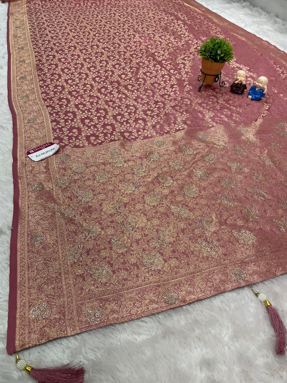 AJ-NUKUM SATIN SILK FABRIC SAREE WITH HEAVY DESIGN WITH HEAVY JARKAN WORKK ALL OVER ON SAREE AND BLOUSE WITH LUXURIOUS TASSELS