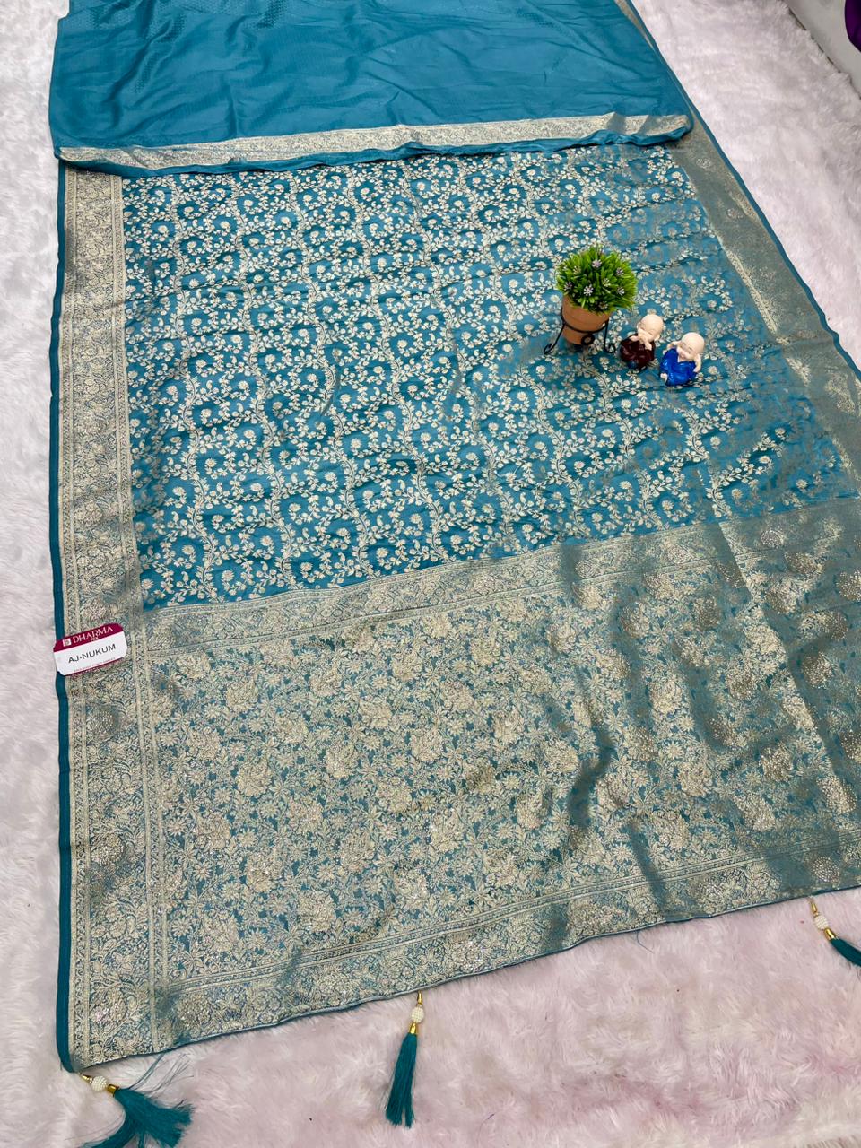 AJ-NUKUM SATIN SILK FABRIC SAREE WITH HEAVY DESIGN WITH HEAVY JARKAN WORKK ALL OVER ON SAREE AND BLOUSE WITH LUXURIOUS TASSELS