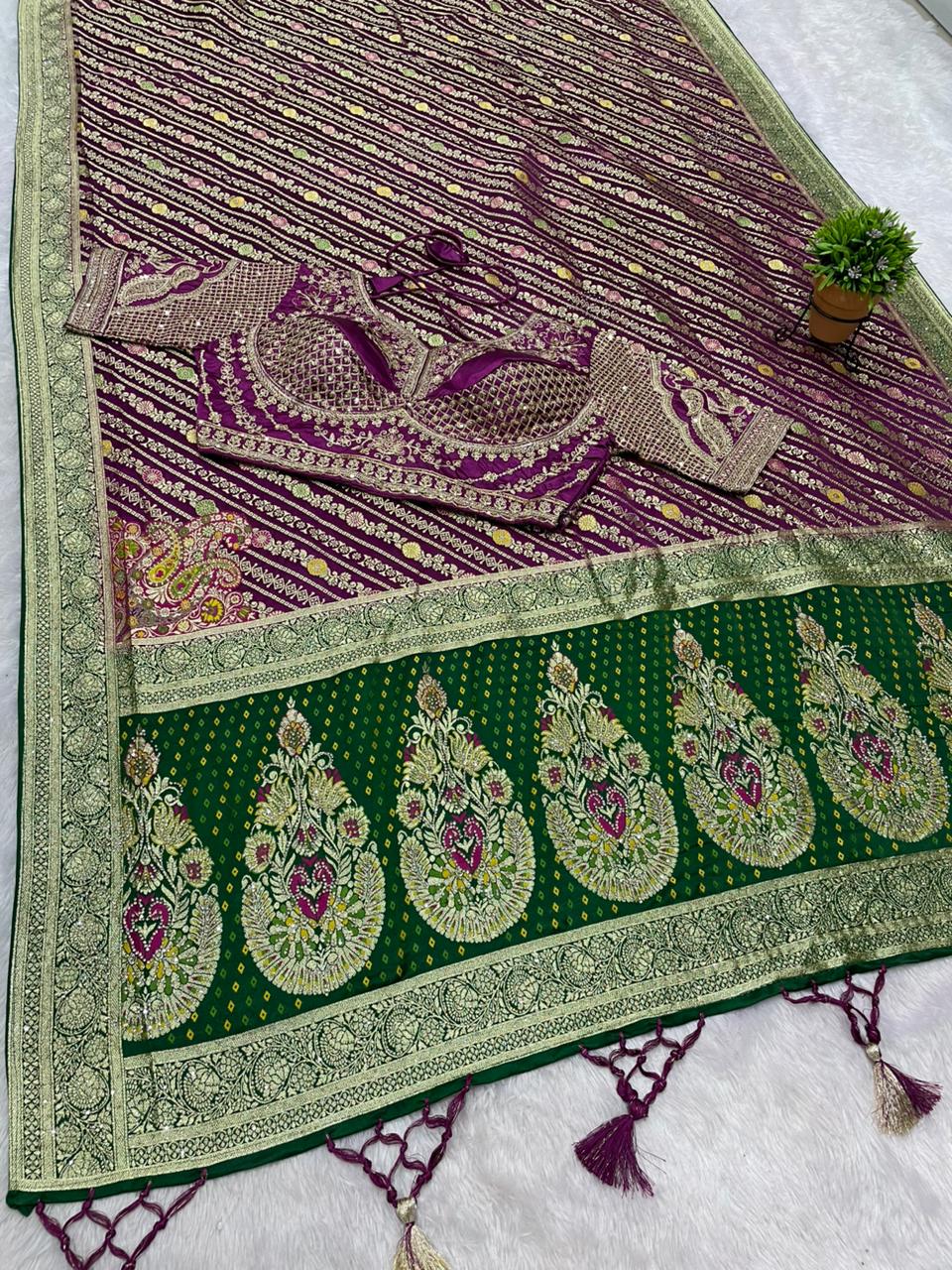AJ-RAJAL NAYLON SATIN  FABRIC SAREE WITH BEAUTIFUL DESIGN WITH HEAVY JARKAN WORK WITH MEENAKARI WORK WITH HEAVY EMBROIDERY WORK STICHED BLOUSE WITH LUXUIROUS TAASELS
