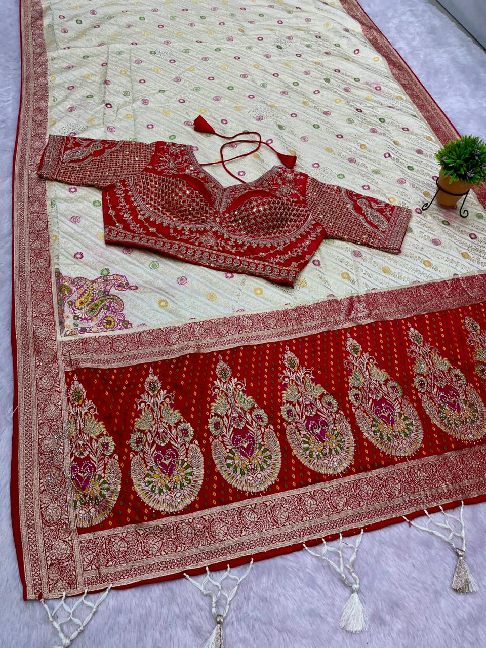AJ-RAJAL NAYLON SATIN  FABRIC SAREE WITH BEAUTIFUL DESIGN WITH HEAVY JARKAN WORK WITH MEENAKARI WORK WITH HEAVY EMBROIDERY WORK STICHED BLOUSE WITH LUXUIROUS TAASELS