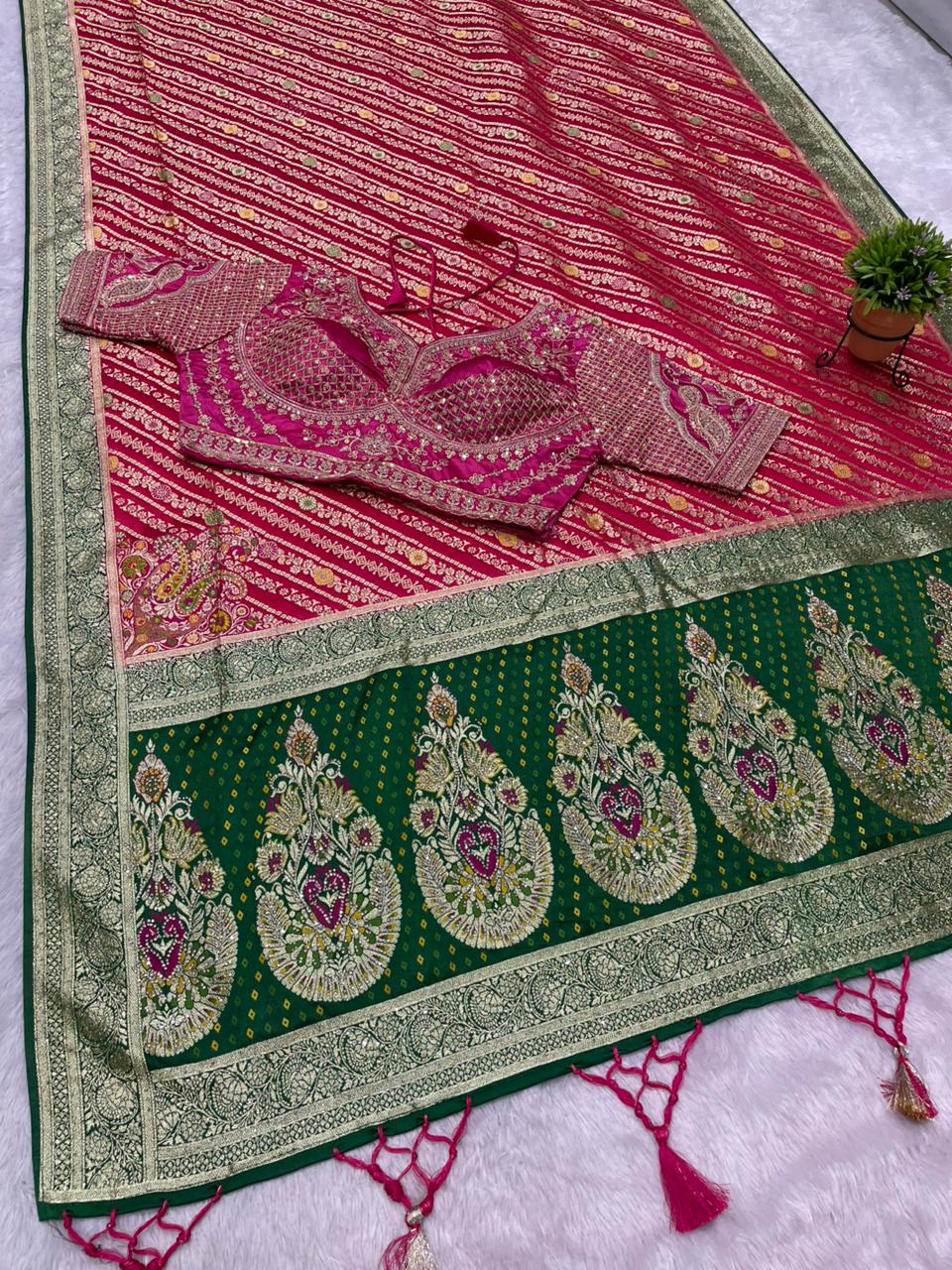 AJ-RAJAL NAYLON SATIN  FABRIC SAREE WITH BEAUTIFUL DESIGN WITH HEAVY JARKAN WORK WITH MEENAKARI WORK WITH HEAVY EMBROIDERY WORK STICHED BLOUSE WITH LUXUIROUS TAASELS