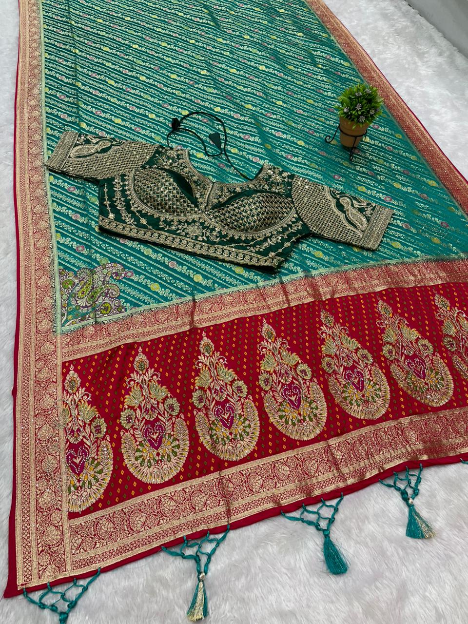 AJ-RAJAL NAYLON SATIN  FABRIC SAREE WITH BEAUTIFUL DESIGN WITH HEAVY JARKAN WORK WITH MEENAKARI WORK WITH HEAVY EMBROIDERY WORK STICHED BLOUSE WITH LUXUIROUS TAASELS