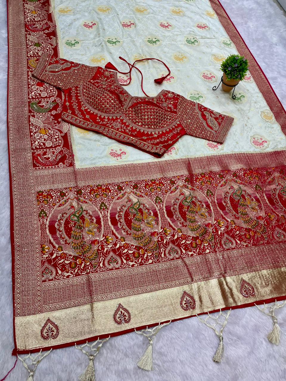 AJ-SIKHA NAYLON SATIN  FABRIC SAREE WITH BEAUTIFUL DESIGN WITH HEAVY JARKAN WORK WITH MEENAKARI WORK WITH HEAVY EMBROIDERY WORK STICHED BLOUSE WITH LUXUIROUS TAASELS