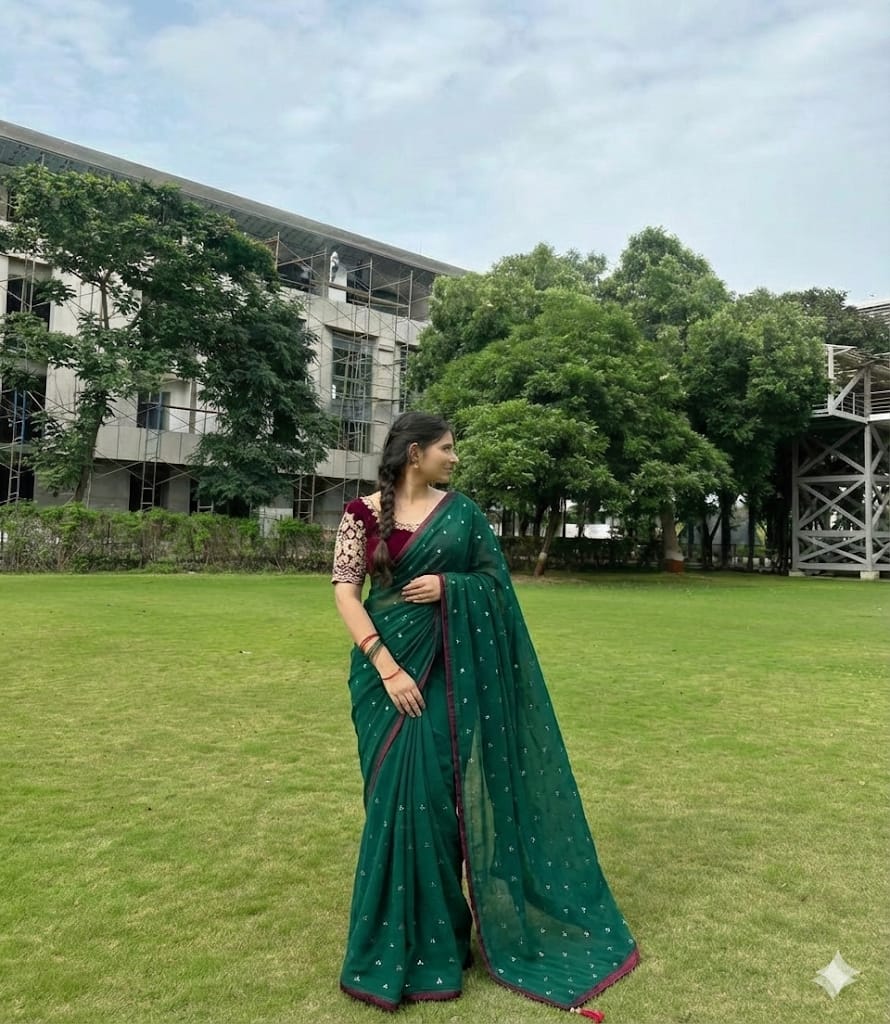 NN-2043 Star georgette fabric with siroski work allover saree with piping and tussels with Contrast rich embroidary sequence work blouse