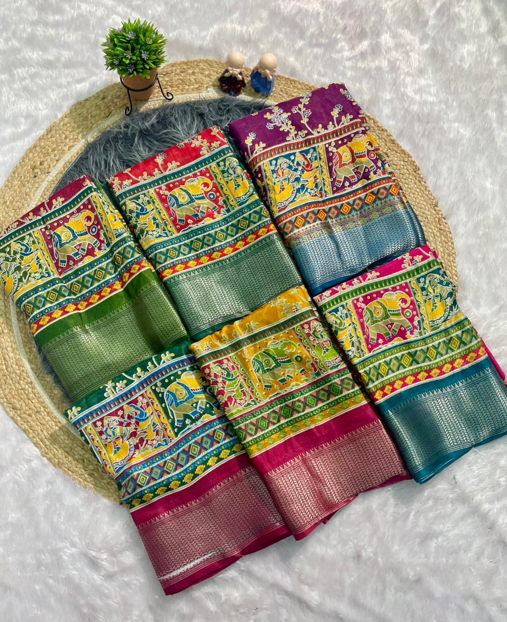 CP-7142 DOLA SILK FABRIC SAREE WITH BEAUTIFUL DESIGN WITH POSITION TYPE PRINT AND JHAL DEISGN ON BODY WITH BLOUSE