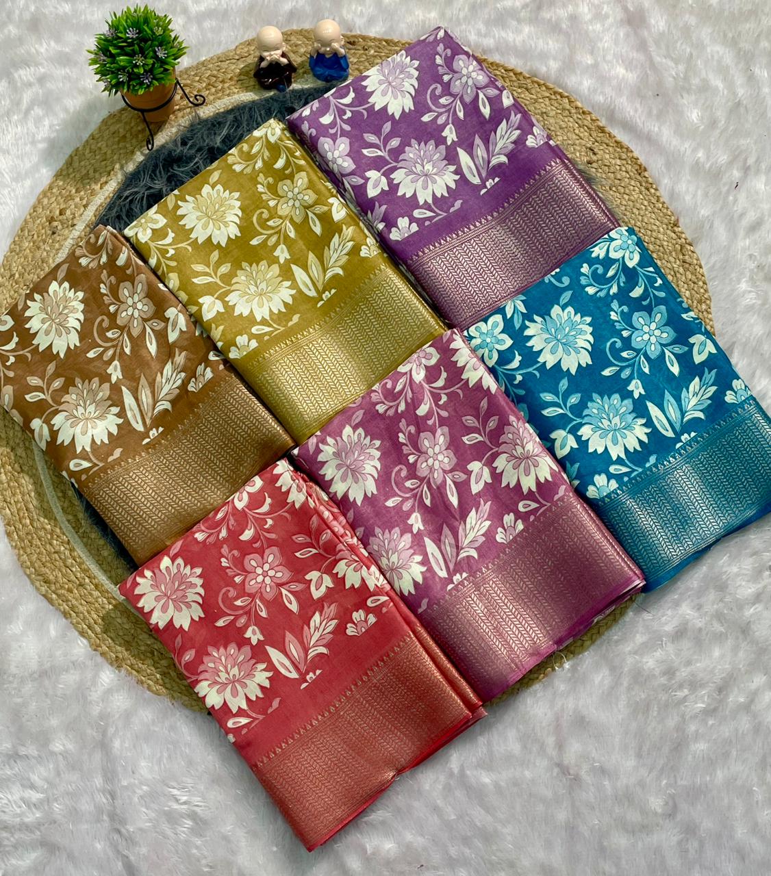 CP-7144 DOLA SILK FABRIC SAREE WITH FLOWER PRINT ON SAREE WITH BEAUTIFUL BORDER WITH BLOUSE