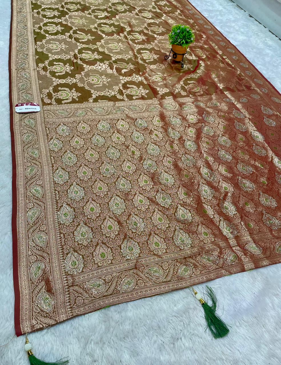 AJ-RENISHA  SOFT SILK FABRIC SAREE WITH BEAUTIFUL DESIGN WITH HEAVY SIROSKI WORK ON SAREE AND LUXURY TASSELS WITH BUTTI BLOUSE