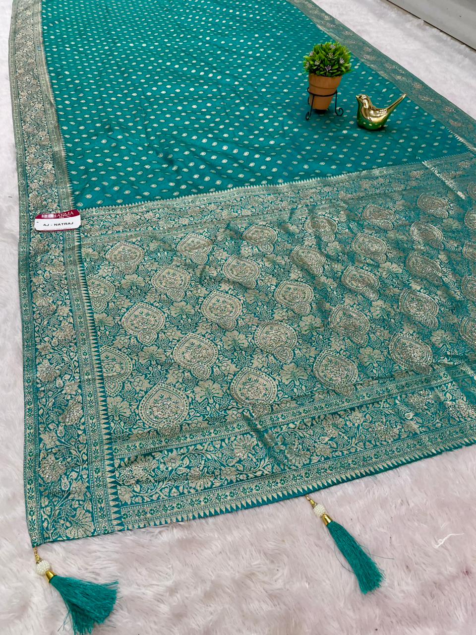 AJ-NATRAJ SATIN SILK FABRIC SAREE WIRH HEAVY SIROSKI WORK ON SAREE WITH BUTTI DESIGN ON ALL OVER ON BODY WITH LUXURIOUS TASSELS WITH BLOUSE