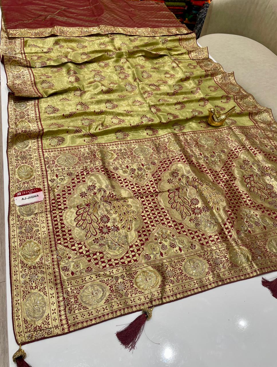 AJ-JIGNA KANJIVARAM SILK SAREE WITH SUPER HEAVY DESIGN WITH RICH PALLU WITH BEAUTIFUL PEACOCK DESIGN WITH JARKAN WORK AND ON BODY PEACOCK BUTTI DESIGN WITH DMC SIROSKI WORK AND WITH SUPER PREMIUM MATCHING WITH LUXURY TASSELS