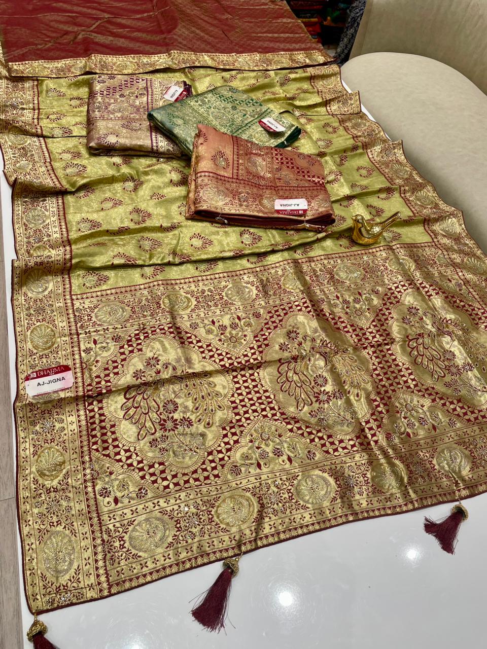 AJ-JIGNA KANJIVARAM SILK SAREE WITH SUPER HEAVY DESIGN WITH RICH PALLU WITH BEAUTIFUL PEACOCK DESIGN WITH JARKAN WORK AND ON BODY PEACOCK BUTTI DESIGN WITH DMC SIROSKI WORK AND WITH SUPER PREMIUM MATCHING WITH LUXURY TASSELS