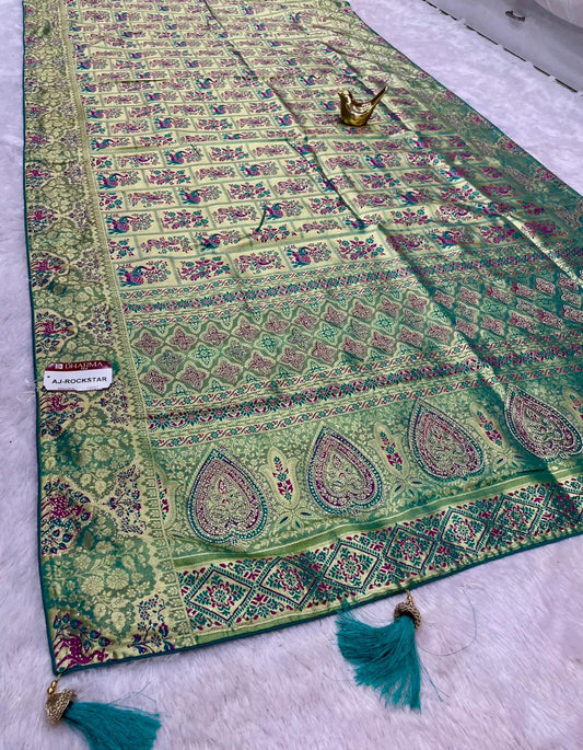 AJ-ROCKSTAR TISSUE FABRIC SAREE WITH RICH PALLU DESIGN WITH GAJRAJ AND PEAOCK DESIGN WITH HEAVY JARKAN WORK WITH MEENAKARI WORK WITH BROCADE BLOUSE WITH LUXURIOUS TASSELS