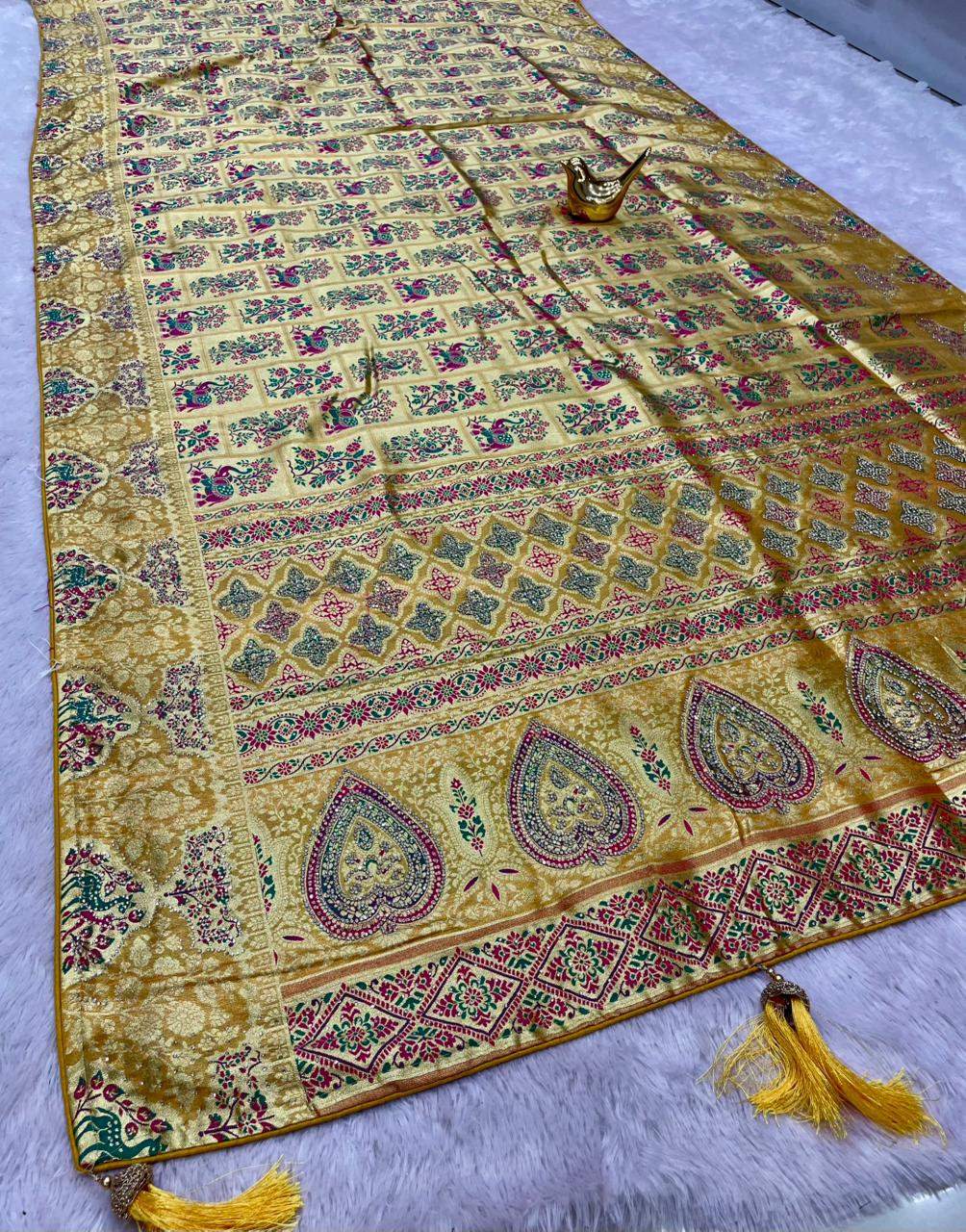 AJ-ROCKSTAR TISSUE FABRIC SAREE WITH RICH PALLU DESIGN WITH GAJRAJ AND PEAOCK DESIGN WITH HEAVY JARKAN WORK WITH MEENAKARI WORK WITH BROCADE BLOUSE WITH LUXURIOUS TASSELS