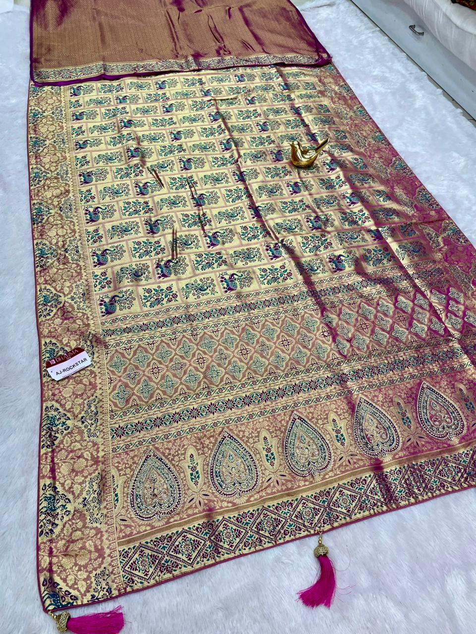 AJ-ROCKSTAR TISSUE FABRIC SAREE WITH RICH PALLU DESIGN WITH GAJRAJ AND PEAOCK DESIGN WITH HEAVY JARKAN WORK WITH MEENAKARI WORK WITH BROCADE BLOUSE WITH LUXURIOUS TASSELS