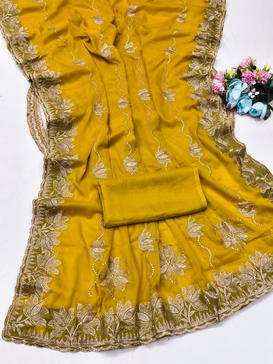 DF-MANASVI STAR GEORGETTE FABRIC SAREE WITH EMBROIDERY WORK WITH LOTUS DESIGN WITH RELINING PATTERN BODY WITH PLAIN BLOUSE