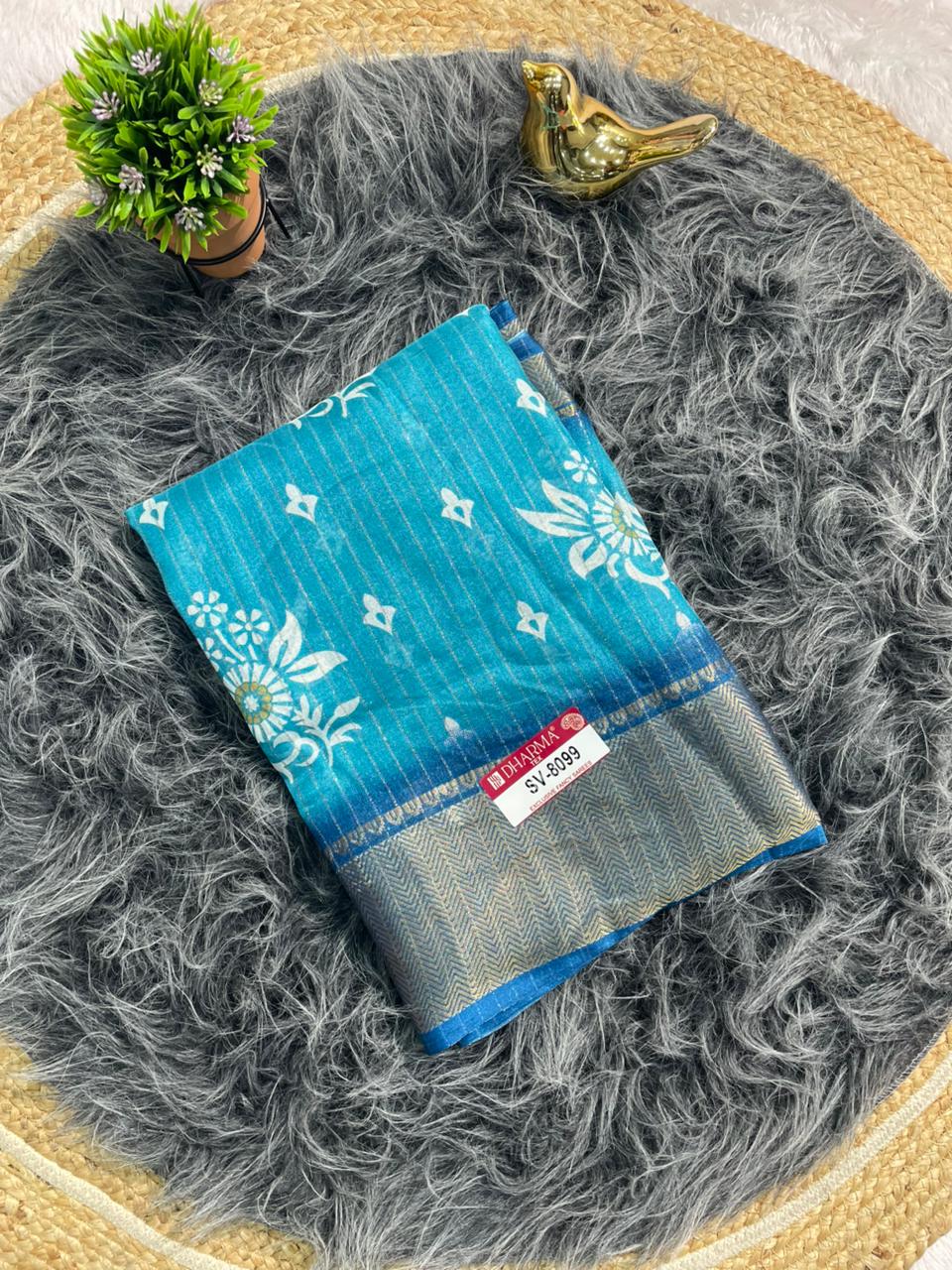 SV-8099 DOLA RIKO FABRIC SAREE WITH BEUATIFUL DESIGN WITH RICH PALLU WITH JACUARD BORDER AND BLOUSE