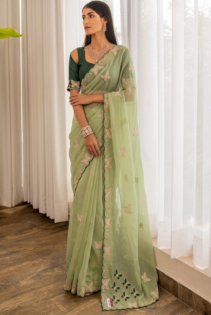 NN-2158 STAR GEORGETTE FABRIC SAREE WITH EMBROIDERY WORK WITH BEAUTIFUL DESIGN WITH CUTWORK BORDER WITH CONTRAST BUTTI BLOUSE