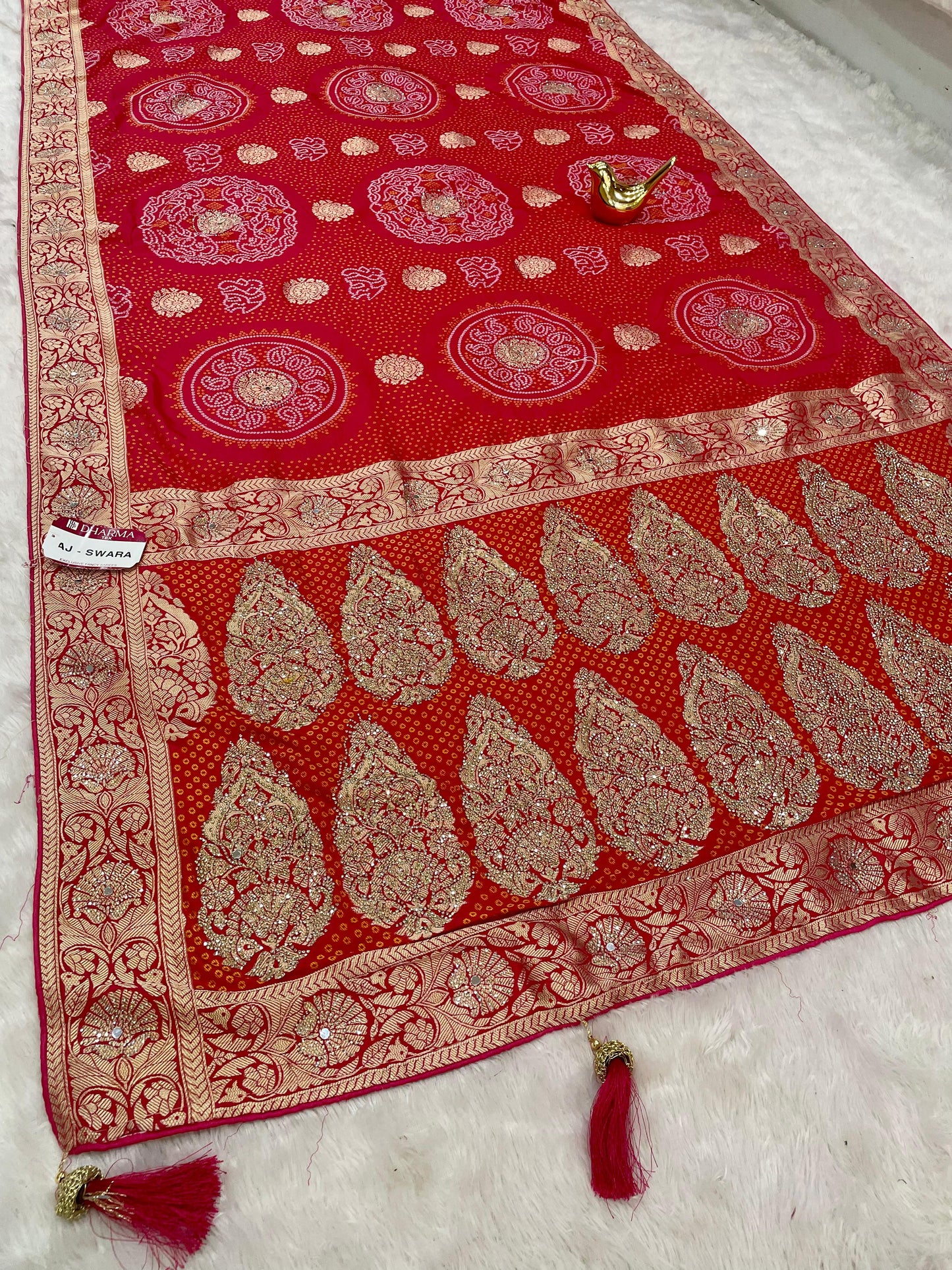 AJ-SWARA  HEAVY GEORGETTE FABRIC SAREE WITH BEAUTIFUL BANDHANI DESIGN WITH HEAVY JARKAN WORK AND REAL MIRROR WORK WITH RICH PALLU DESIGN WITH BUTTI BLOUSE AND LATKAN AND PIPING