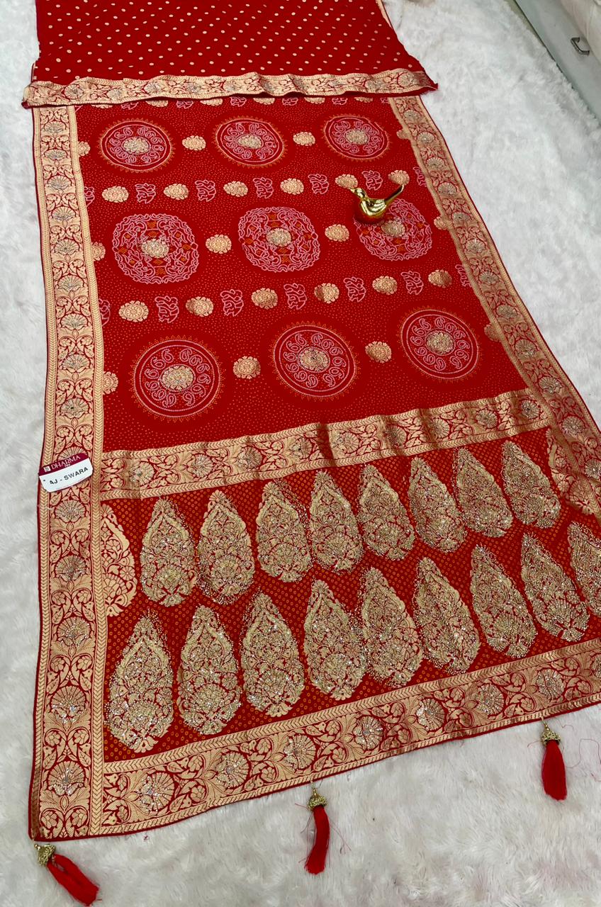 AJ-SWARA  HEAVY GEORGETTE FABRIC SAREE WITH BEAUTIFUL BANDHANI DESIGN WITH HEAVY JARKAN WORK AND REAL MIRROR WORK WITH RICH PALLU DESIGN WITH BUTTI BLOUSE AND LATKAN AND PIPING