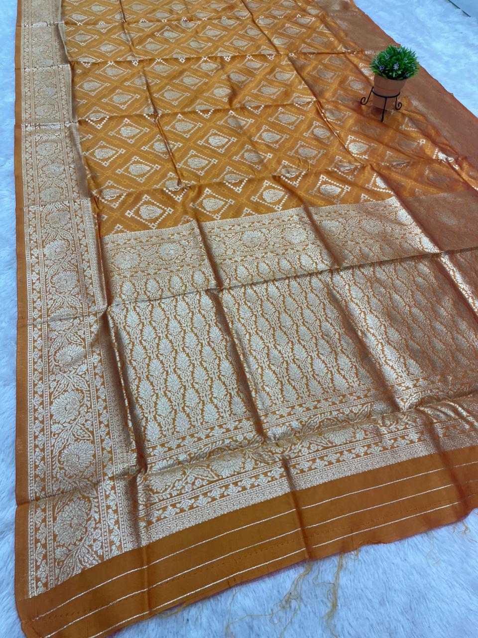 AJ-RATAN RAJ LITCHI KOTA FABRIC SAREE WITH RICH PALLU DESIGN WITH BANARSHI ZARI WORK WITH BUTTI BLOUSE