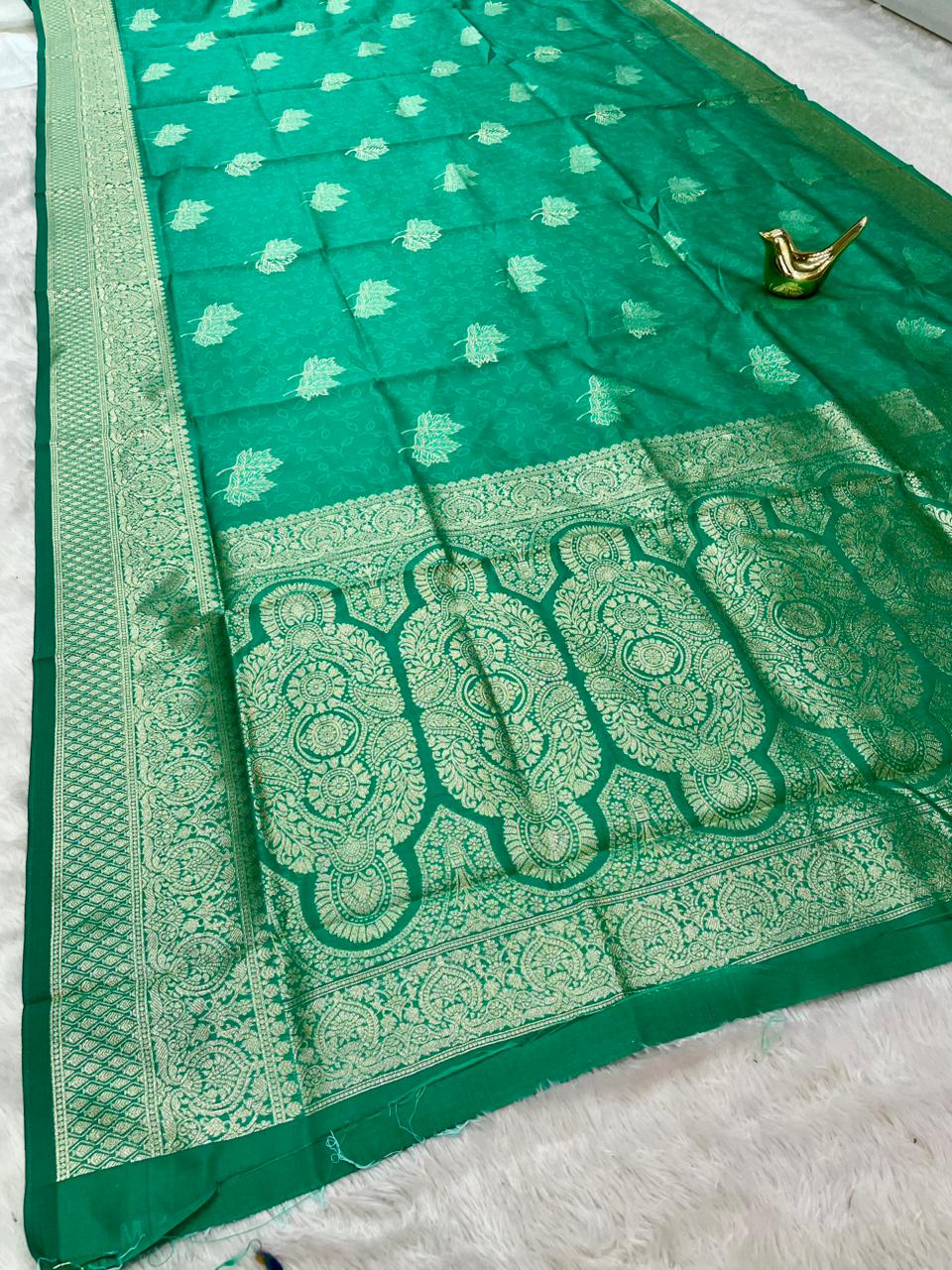 AJ-PRAPTI LITCHI KOTA FABRIC SAREE WITH RICH PALLU DESIGN WITH BANARSHI ZAREE WITH BEAUTIFUL FLOWER DESIGN WITH BUTTI BLOUSE