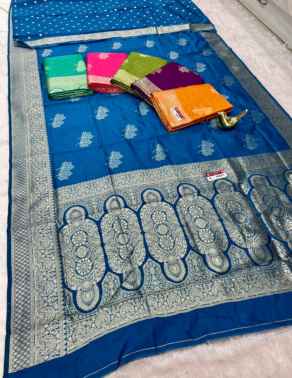 AJ-PRAPTI LITCHI KOTA FABRIC SAREE WITH RICH PALLU DESIGN WITH BANARSHI ZAREE WITH BEAUTIFUL FLOWER DESIGN WITH BUTTI BLOUSE