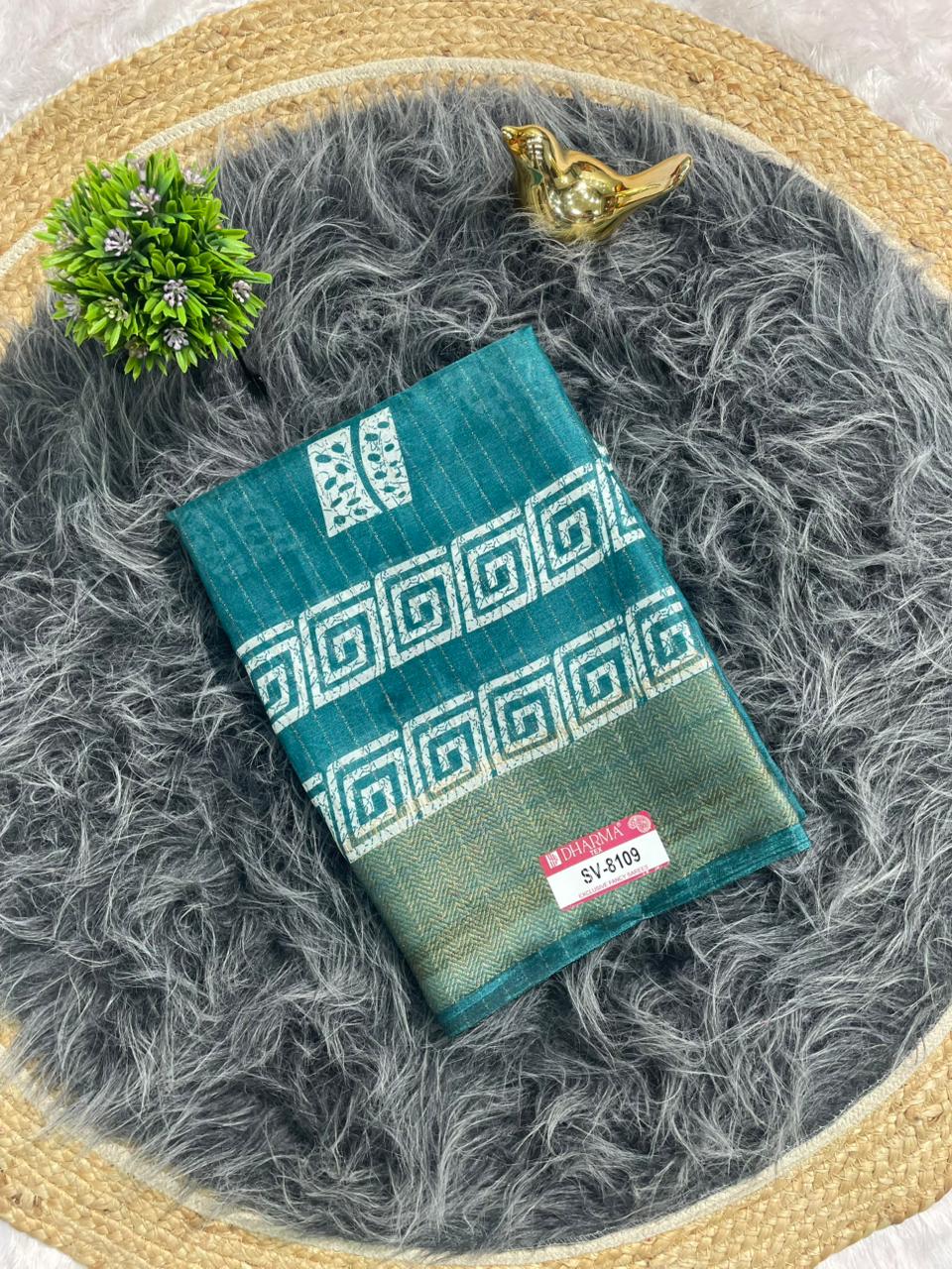 SV-8109 DOLA RIKO FABRIC SAREE WITH RICH PALLU WITH BEAUTIFUL PRINT WITH BUTTI BLOUSE