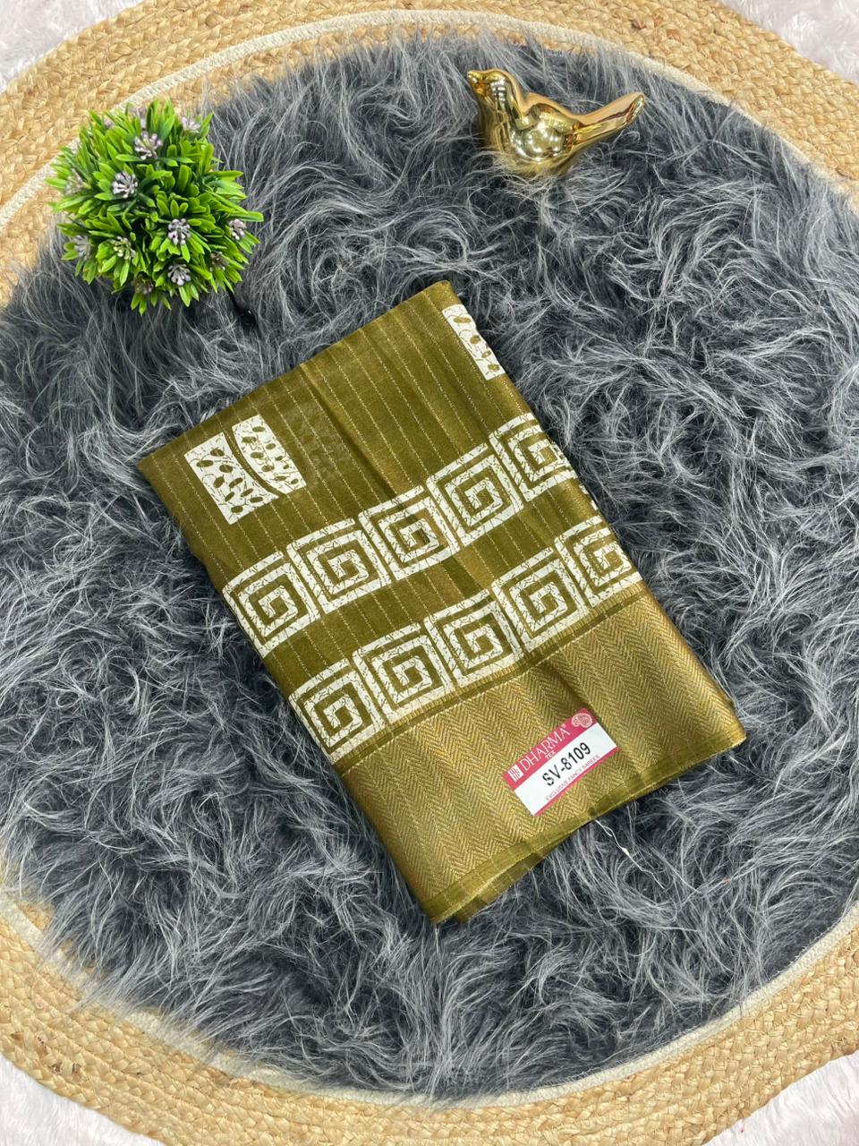 SV-8109 DOLA RIKO FABRIC SAREE WITH RICH PALLU WITH BEAUTIFUL PRINT WITH BUTTI BLOUSE