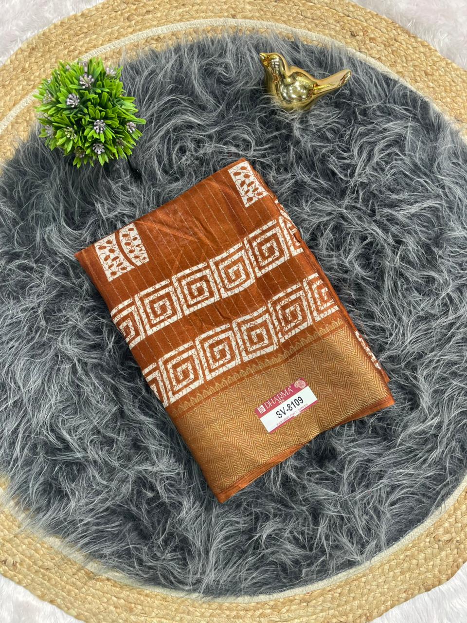 SV-8109 DOLA RIKO FABRIC SAREE WITH RICH PALLU WITH BEAUTIFUL PRINT WITH BUTTI BLOUSE