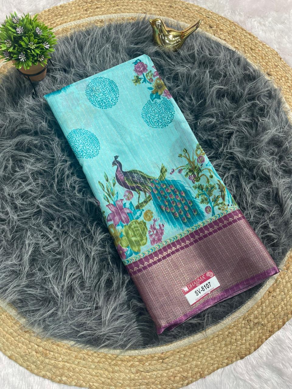 SV-8107 DOLA RIKO FABRIC SAREE WITH BEAUTIFUL PEACOCK PRINT WITH ALL OVER ON SAREE WITH JACUARD BORDER WITH BLOUSE