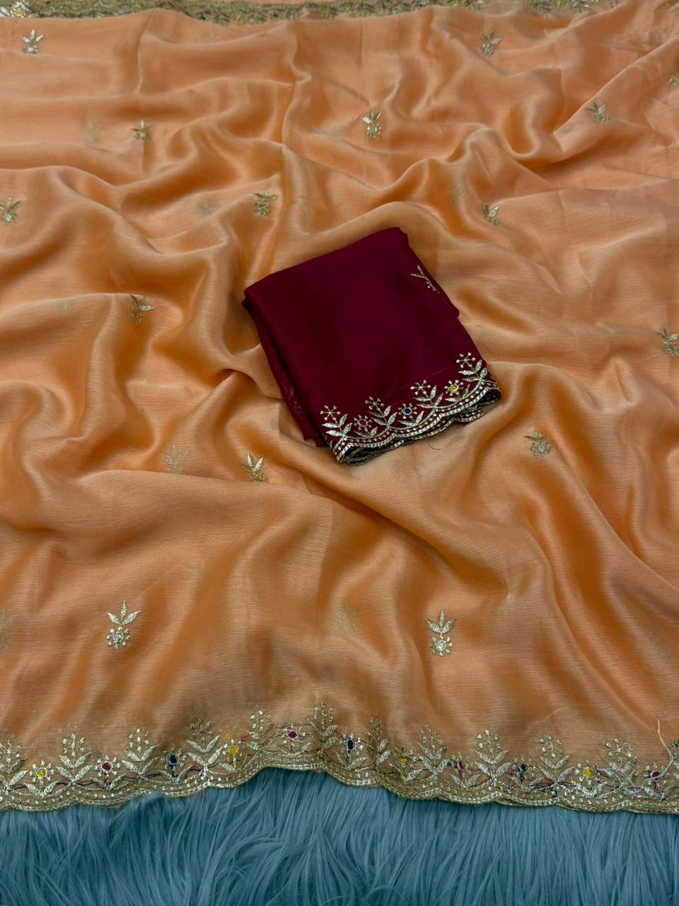 NN-2173 MOSS CHIFFON FABRIC SAREE WITH EMBROIDERY ON BORDER AND BUTTI ALL OVER THE SAREE WITH CONTRAST EMBROIDERY BLOUSE