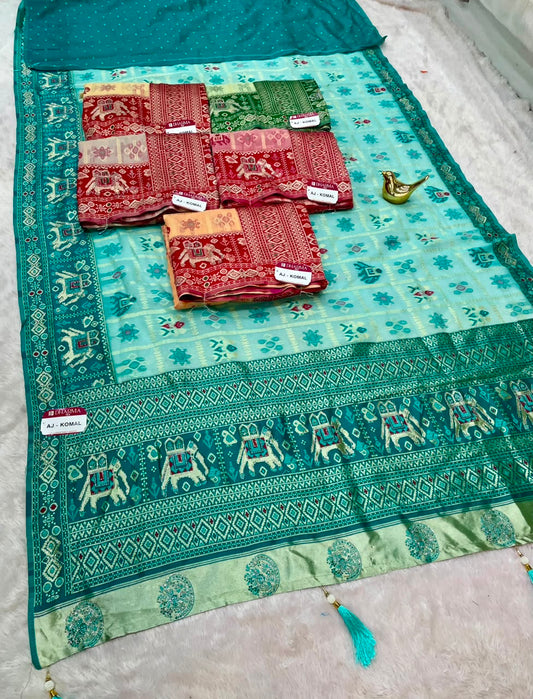 AJ-KOMAL COTTON FABRIC SAREE WITH BEAUTIFUL RICH PALLU DESIGN WITH BEAUTIFUL PATOLA DESIGN WITH LAGNI PATTA WITH TASSELS AND BLOUSE